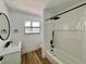 Bathroom featuring modern fixtures and hardwood flooring at 6191 Bullion Blvd, Las Vegas, NV 89103