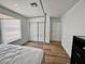 This bedroom boasts wood floors, ample closet space, and a bright, airy atmosphere at 6191 Bullion Blvd, Las Vegas, NV 89103
