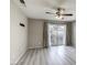 Large bedroom with a ceiling fan and a sliding door to the exterior at 6250 W Flamingo Rd # 43, Las Vegas, NV 89103