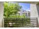 View from a balcony featuring lush landscaping and the exterior of the building at 6250 W Flamingo Rd # 43, Las Vegas, NV 89103