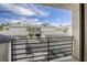 View from a balcony showing an exterior view of townhomes and carports at 6250 W Flamingo Rd # 43, Las Vegas, NV 89103