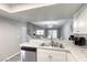 Open kitchen with stainless steel dishwasher and view into dining area at 6250 W Flamingo Rd # 43, Las Vegas, NV 89103