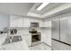Well-equipped kitchen features stainless steel appliances and modern design at 6250 W Flamingo Rd # 43, Las Vegas, NV 89103