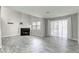 Living room with fireplace and sliding glass door to the outside at 6250 W Flamingo Rd # 43, Las Vegas, NV 89103