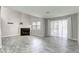 Living room with fireplace and sliding glass door to the outside at 6250 W Flamingo Rd # 43, Las Vegas, NV 89103