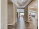 Grand foyer with hardwood floors and modern architectural details at 6311 Baker Creek St, Las Vegas, NV 89149