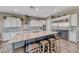 A gourmet kitchen with granite countertops, and stainless steel appliances at 6311 Baker Creek St, Las Vegas, NV 89149