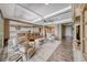 Open living room with wood floors, recessed lighting, and neutral paint at 6311 Baker Creek St, Las Vegas, NV 89149