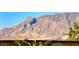 Dramatic, close-up mountain view behind the property showcases the natural beauty of the area at 6311 Baker Creek St, Las Vegas, NV 89149