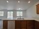 Stylish kitchen featuring a large island, sleek countertops, and modern appliances, perfect for culinary enthusiasts at 6638 Babys Tear Pl, Las Vegas, NV 89148