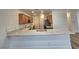 Well-equipped kitchen featuring granite countertops, modern cabinetry, and an efficient layout for cooking and storage at 6638 Babys Tear Pl, Las Vegas, NV 89148