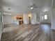 Bright living space featuring sleek floors, neutral walls, and an open layout perfect for modern living and entertaining at 6638 Babys Tear Pl, Las Vegas, NV 89148
