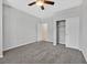 This bright bedroom features plush carpet and ample closet space, perfect for storage and comfort at 7224 Anora St, North Las Vegas, NV 89084