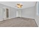 Comfortable primary bedroom with a ceiling fan, ensuite bath, and walk-in closet at 7224 Anora St, North Las Vegas, NV 89084