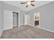 Large bedroom with plush carpet, providing a comfortable and stylish living space at 7224 Anora St, North Las Vegas, NV 89084