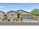 Charming single-story home featuring a two-car garage and well-manicured landscaping at 7224 Anora St, North Las Vegas, NV 89084