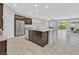 Bright kitchen featuring stainless steel appliances, granite countertops, and an island with sink at 7224 Anora St, North Las Vegas, NV 89084