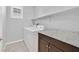 Well-equipped laundry room with modern appliances and granite countertops, offering convenience and style at 7224 Anora St, North Las Vegas, NV 89084