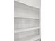 Walk-in pantry with ample shelving for organized storage, perfect for any home at 7224 Anora St, North Las Vegas, NV 89084