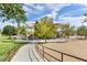 Community playground with slides and covered play areas, and walking path with landscaping, great for outdoor activities at 7224 Anora St, North Las Vegas, NV 89084