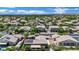 Breathtaking aerial view of the home, displaying lush greenery, mature trees, and a well-manicured neighborhood at 7300 Fresh Harvest Ave, Las Vegas, NV 89131