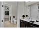 Powder room with modern vanity and tiled floors at 7300 Fresh Harvest Ave, Las Vegas, NV 89131
