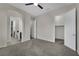 Spacious bedroom boasts neutral walls, carpeted floors, and a walk-in closet for ample storage at 7300 Fresh Harvest Ave, Las Vegas, NV 89131