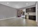 Bonus room with a wet bar and access to a patio via sliding glass doors at 7300 Fresh Harvest Ave, Las Vegas, NV 89131
