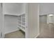 Bright walk-in closet with custom shelving, conveniently located near the entry at 7300 Fresh Harvest Ave, Las Vegas, NV 89131