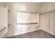 Spacious closet with ample storage space, carpet flooring, and built-in shelving at 7332 Redhead Dr, North Las Vegas, NV 89084