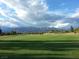 Beautiful golf course with mountain views and lush green grass at 7332 Redhead Dr, North Las Vegas, NV 89084