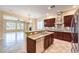 Beautiful kitchen with stainless steel appliances, granite countertops and stylish cabinetry at 7332 Redhead Dr, North Las Vegas, NV 89084