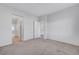Bedroom with plush carpet, ensuite bathroom and closets at 7505 Emerald Stars St # 101, North Las Vegas, NV 89084