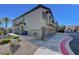 Attractive townhome exterior featuring low-maintenance landscaping at 7505 Emerald Stars St # 101, North Las Vegas, NV 89084