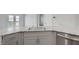 Kitchen sink with granite countertops and stainless steel dishwasher at 7505 Emerald Stars St # 101, North Las Vegas, NV 89084