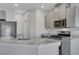Kitchen featuring stainless steel appliances and a stone countertop at 7505 Emerald Stars St # 101, North Las Vegas, NV 89084