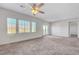 Open living space with a ceiling fan, and natural light at 7505 Emerald Stars St # 101, North Las Vegas, NV 89084