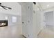 Hallway view featuring access to the living room and closet at 7865 March Brown Ave, Las Vegas, NV 89149