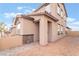 Side view of a two-story home showcasing a well-maintained exterior and desert landscaping at 789 Black Palace St, Henderson, NV 89011