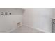 Spacious laundry room with tile flooring and white walls and hook-ups for a washer and dryer at 789 Black Palace St, Henderson, NV 89011