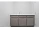 Laundry room includes a sleek sink with modern fixtures, perfect for added convenience at 789 Black Palace St, Henderson, NV 89011