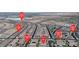 Community aerial view showing a residential area with organized street grids and diverse home designs at 789 Drammatico Pl, Henderson, NV 89011