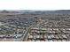 Expansive aerial view showcasing a large residential community with consistent architectural styles at 789 Drammatico Pl, Henderson, NV 89011