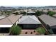 Aerial view of the backyard with low-maintenance landscaping and backyard patio at 789 Drammatico Pl, Henderson, NV 89011