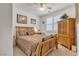 Comfortable bedroom features stylish furnishings, neutral decor, and abundant natural light at 789 Drammatico Pl, Henderson, NV 89011