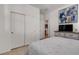 Clean bedroom featuring closet, shutters, and ample natural light at 789 Drammatico Pl, Henderson, NV 89011
