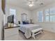 Bright bedroom with neutral tones, shutters, and ample natural light for a serene retreat at 789 Drammatico Pl, Henderson, NV 89011