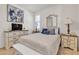 Comfortable bedroom featuring stylish furnishings, neutral decor, and abundant natural light at 789 Drammatico Pl, Henderson, NV 89011