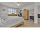 Comfortable bedroom with a ceiling fan, spacious layout, and lots of room for storage and personal touches at 789 Drammatico Pl, Henderson, NV 89011