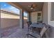 Covered patio featuring a dining set, perfect for outdoor entertaining at 789 Drammatico Pl, Henderson, NV 89011